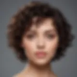 A woman with curly short hair showcasing a stylish look