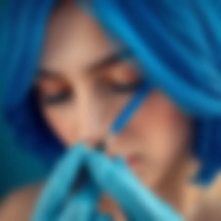 Close-up of blue hair dye application technique