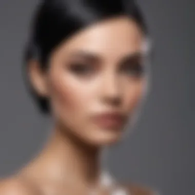 A close-up of glossy black hair styled elegantly on a medium skin tone