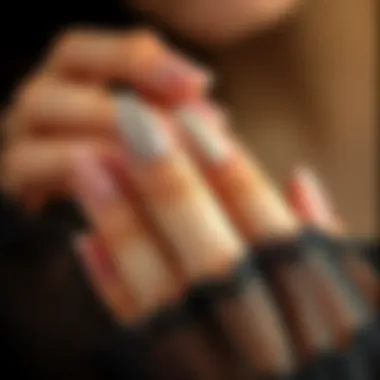 Elegance in Artificial Nail Application Beautifully applied artificial nails showcasing elegance.