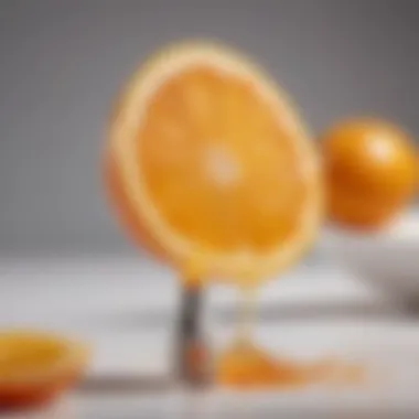 A vibrant orange slice next to a dropper of vitamin C serum reflecting sunlight